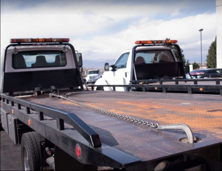 Flat Bed Tow Truck Towing Services - DHS Towing & Automotive LLC